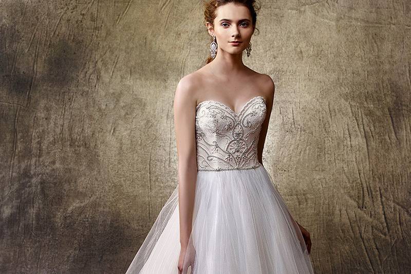 Style Libby	<br>	Fit for a modern-day princess, this full A-line gown is sweepingly romantic and regal with a classic strapless sweetheart neckline on the most enchantingly gorgeous beaded Chantilly lace bodice. An impossibly soft and flowy tulle skirt provides the dreamiest effect underneath waist-cinching beading at the natural waistline. Complete with an invisible back zipper for a seamless look.