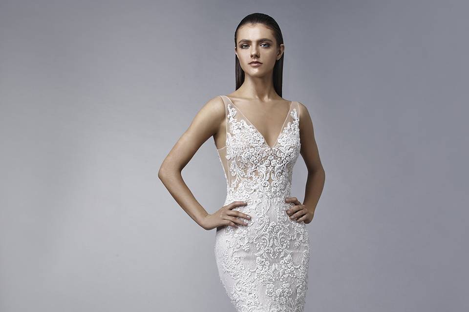 Enzoani	Morgan		Classic meets sexy in this full-length, lace and tulle mermaid stunner. A deep sweetheart neckline is framed with delicate lace cap sleeves that extend to a gorgeous keyhole back. Complete with a showstopping lace train and invisible back zipper and button closure.