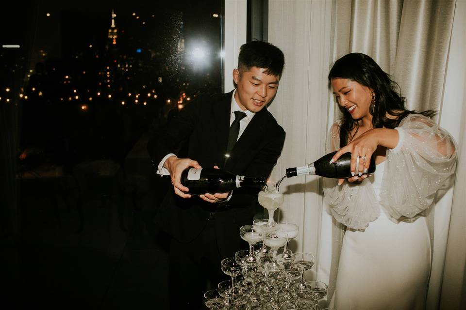 Couple with a champagne tower