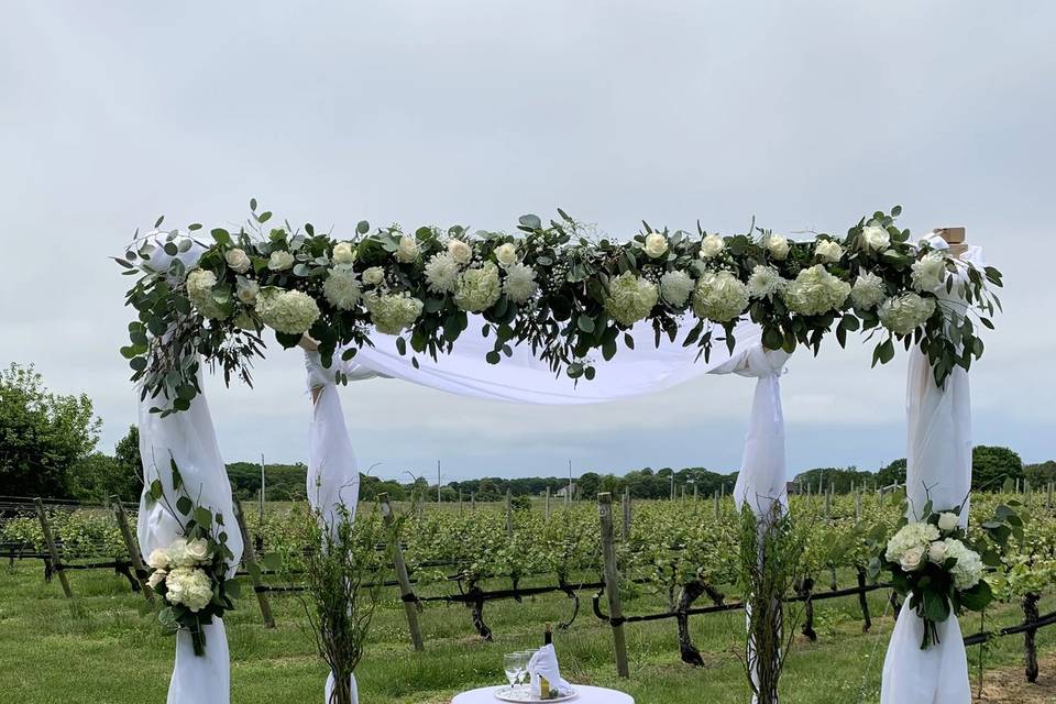 Lush ceremony decor