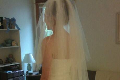 Custom gown without detachable bow.  After the wedding this linen gown could be used as a lovely summer dress.