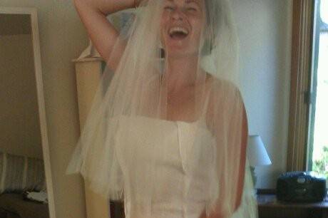 Joyful fitting of custom gown and vel