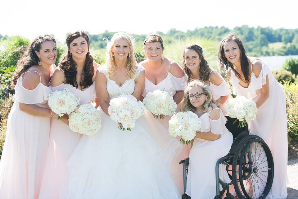 Wedding party holding bouquets