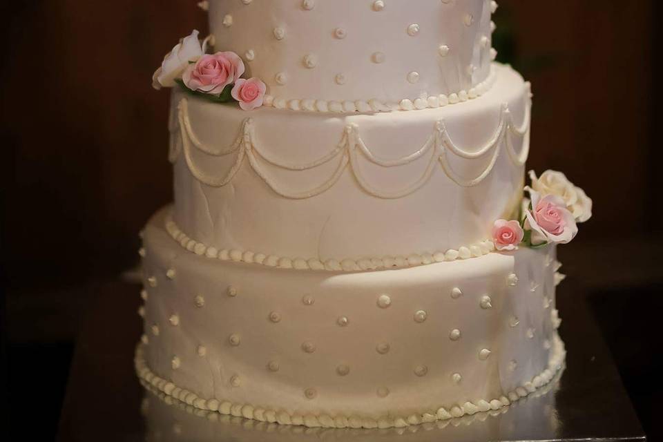 Wedding cake with pink flowers