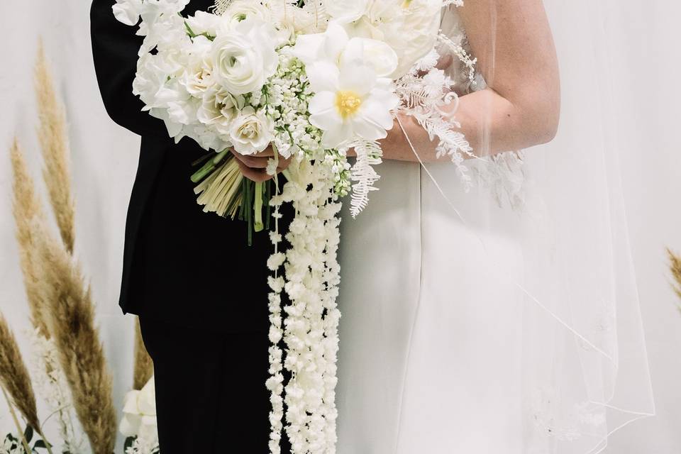 Couple holding bouquet
