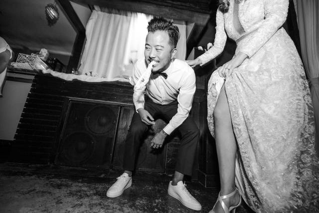 Bride and groom having fun