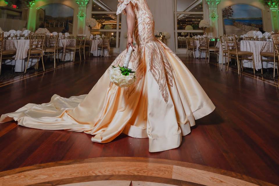 Bride showing off her gown