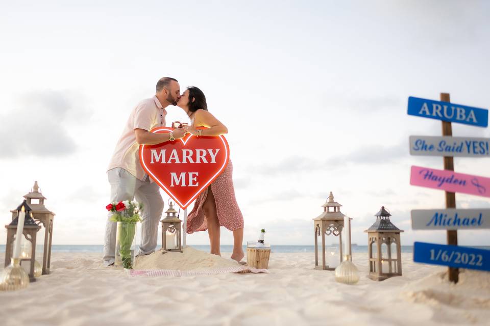 Beach Proposal Kiss