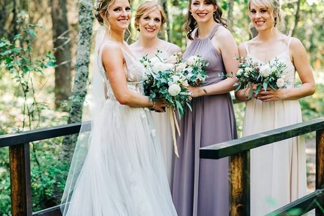 Bride and Bridesmaids in Woods