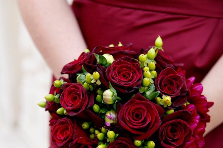 Bridesmaid with red bouquet