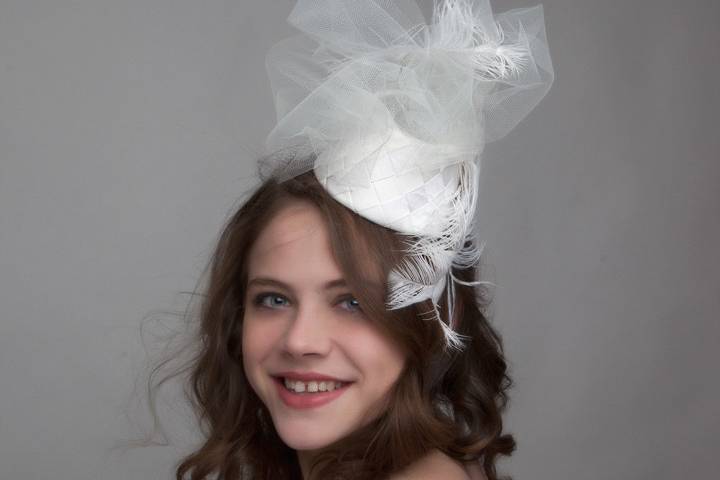 Fun flirty fascinator with veiling