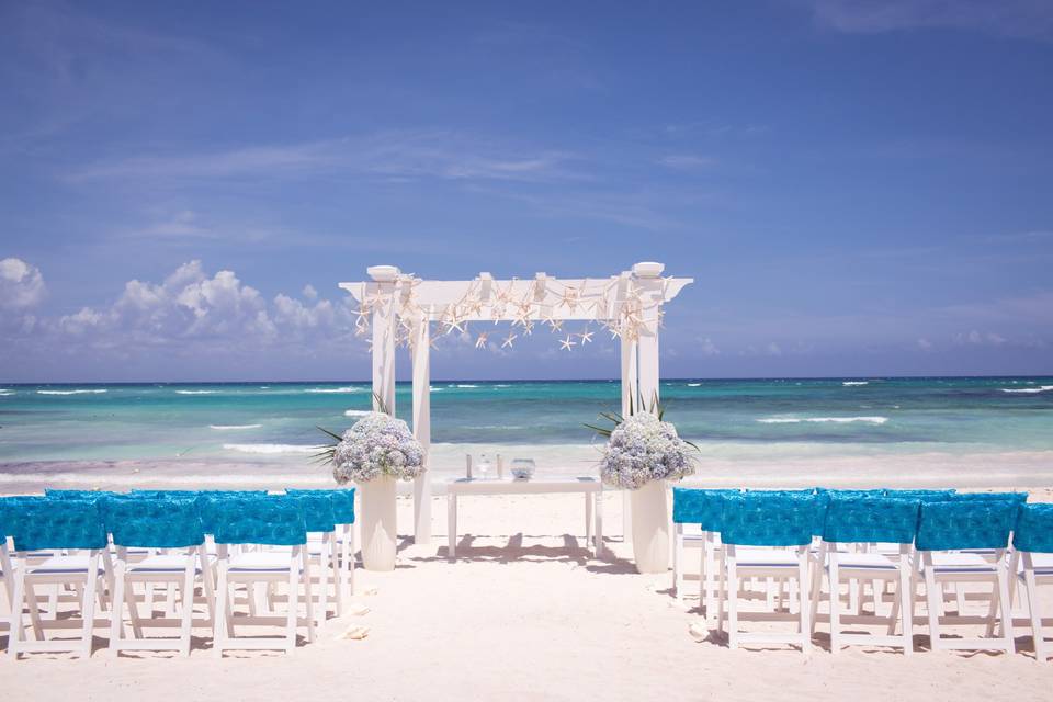 Ceremony setup under blue skies