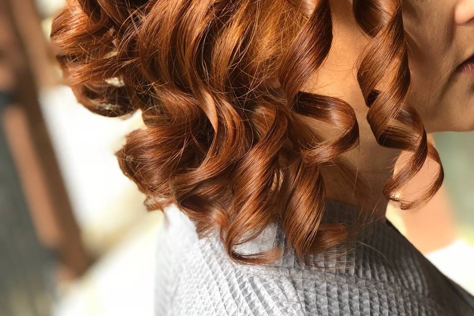 Ginger short hair with braids and curls