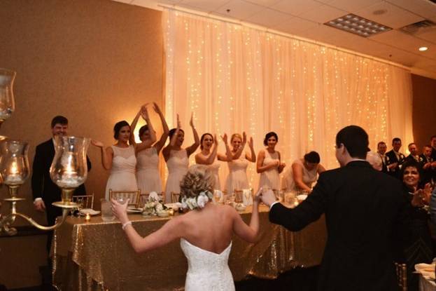 The newly wed couples with their bridesmaids and groomsmen