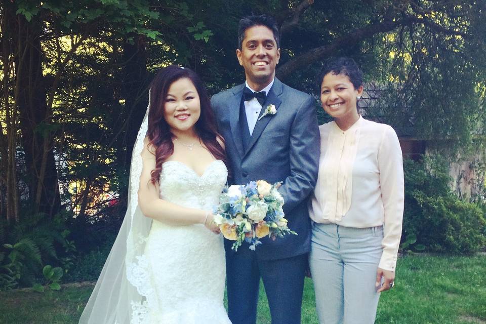 Groom, officiant and bride