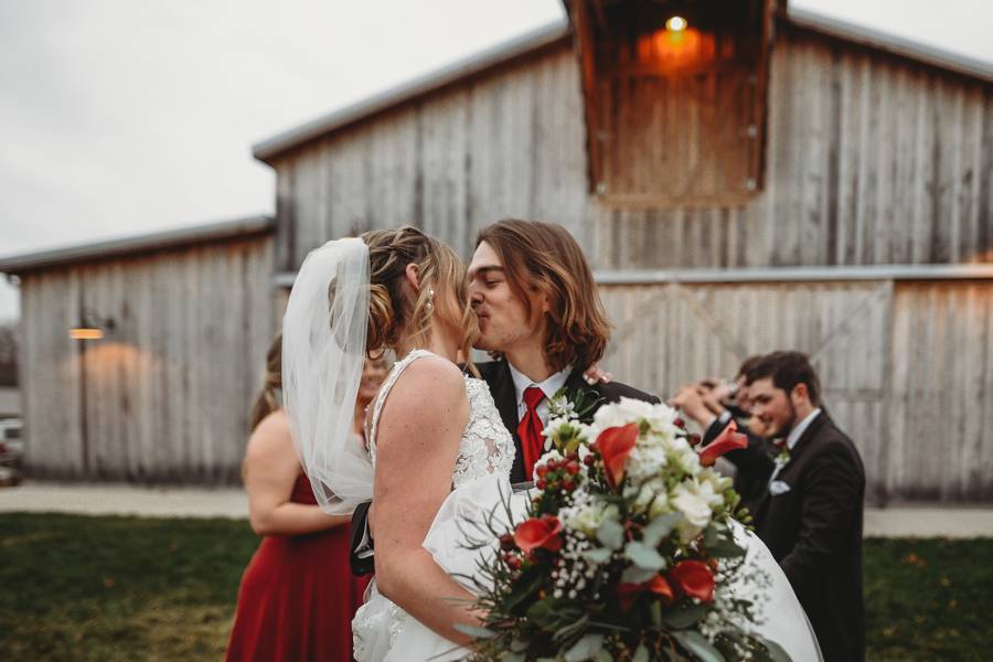 Couple in front of the barn