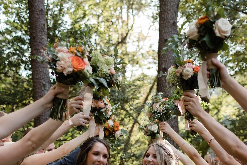 The brides and their party