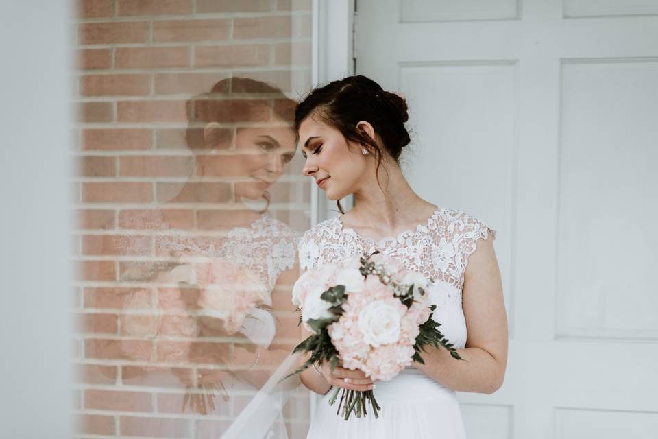 Bride reflected in the window