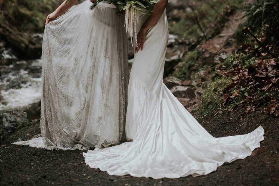 Brides by a waterfall