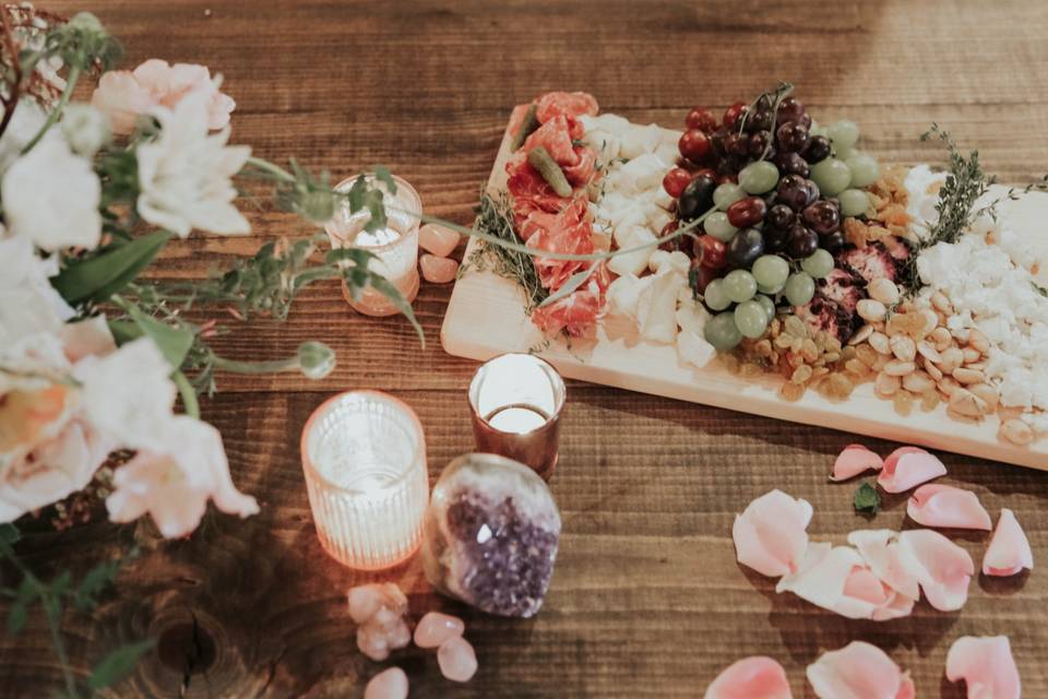 Cheese board adorned with flowers
