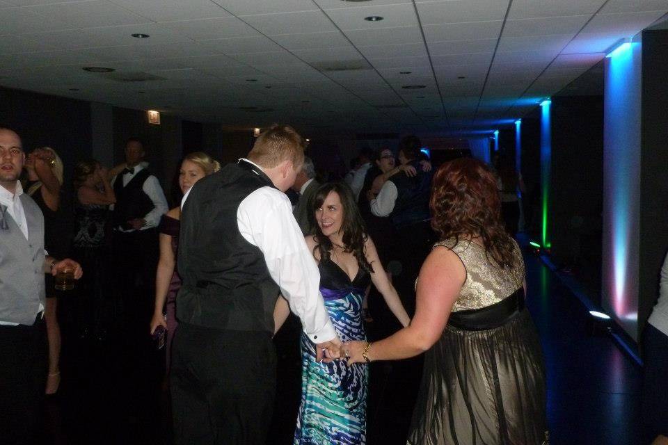 Guests enjoy dancing with a great view of the city skyline.