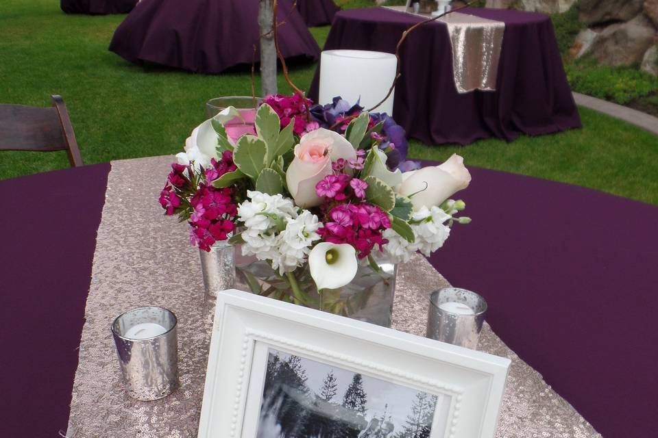 Flowers, candles, and photograph