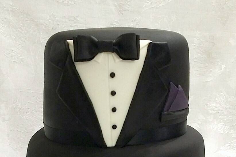 Grooms cake formal black and white tuxedo themed, contains 40 servings.