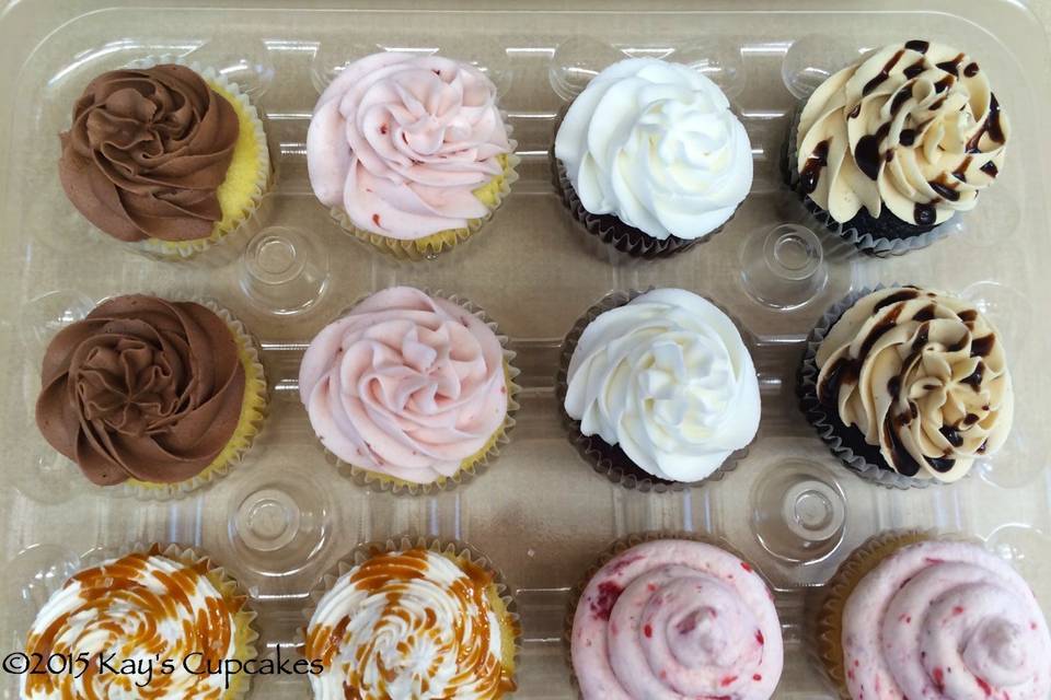 Cupcake sampler: almond with chocolate buttercream, vanilla with strawberry buttercream, red velvet with vanilla buttercream, chocolate with peanut butter buttercream, vanilla with salted caramel buttercream, strawberry shortcake cupcakes