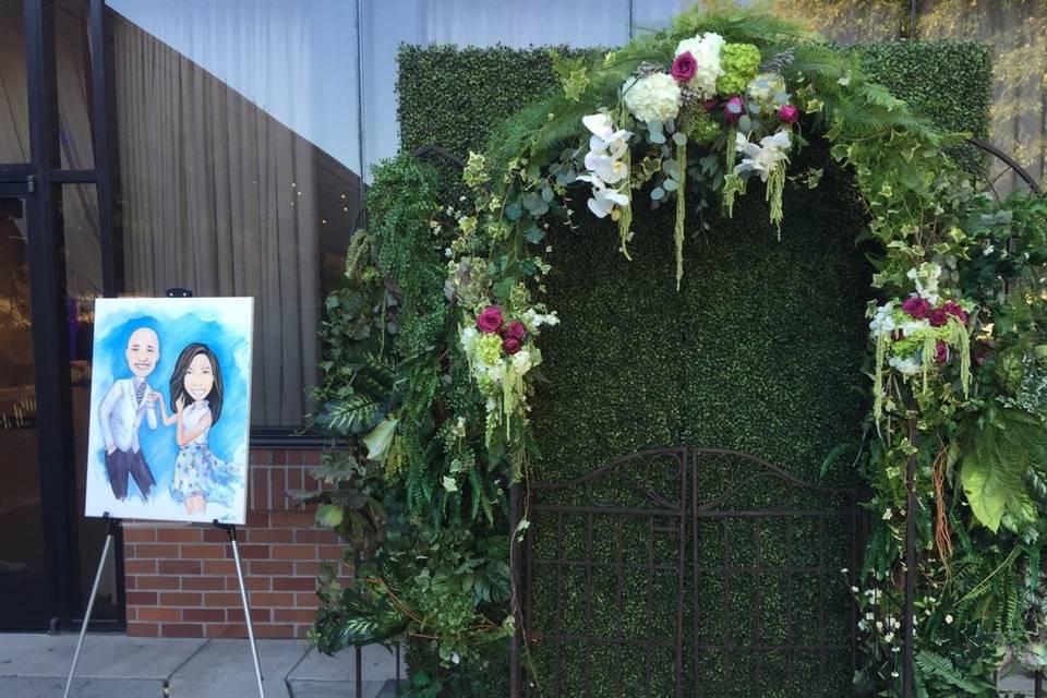 Wedding artwork and green wall backdrop