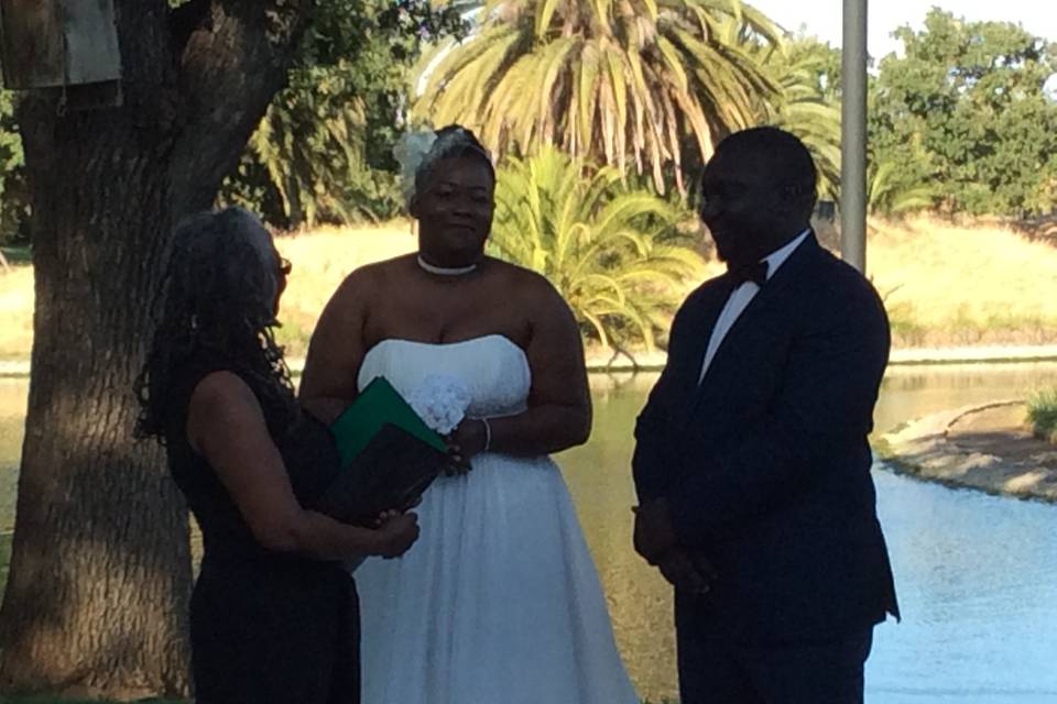 The couple with officiant