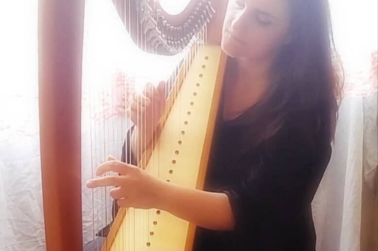 Playing the harp