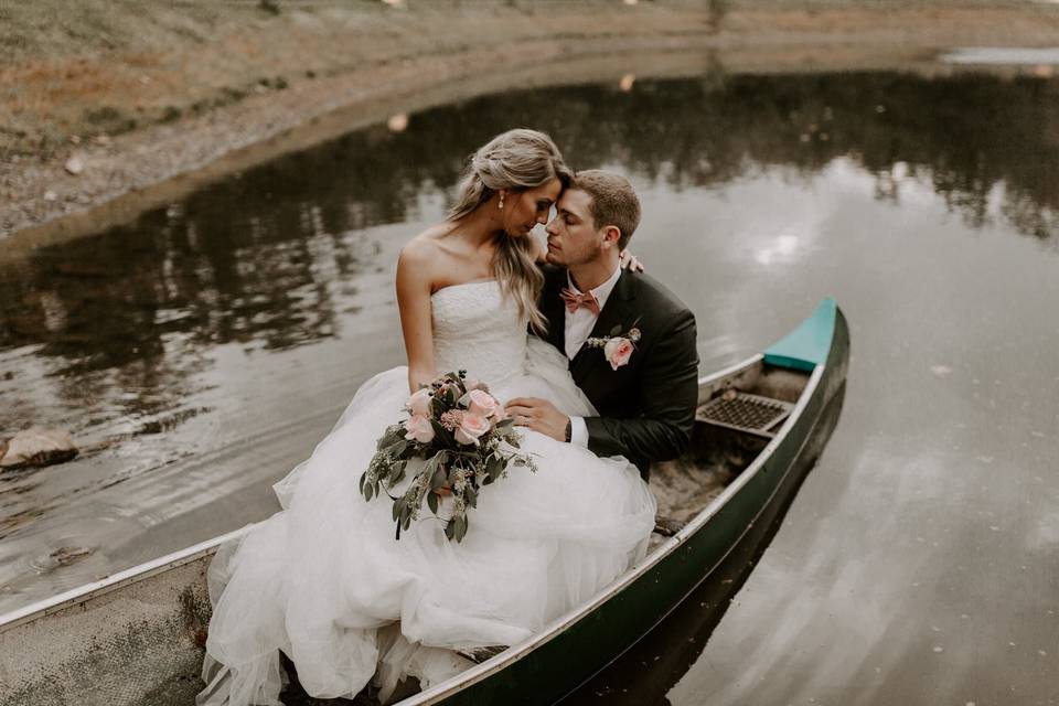 Canoe on pond