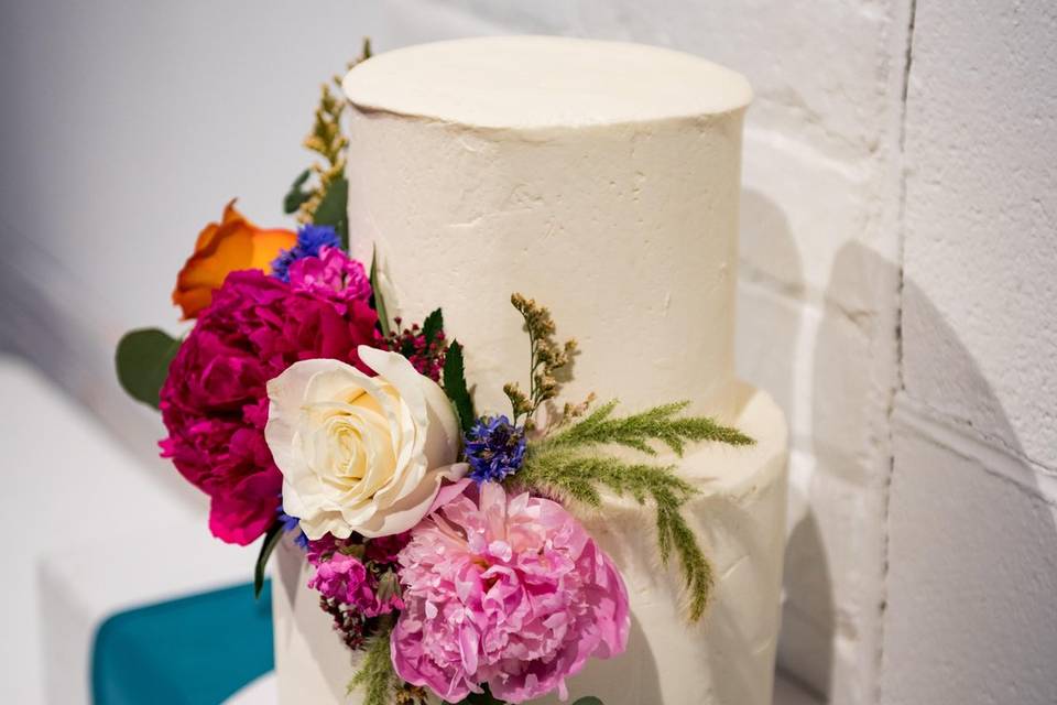 Cake against brick wall