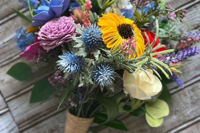 Wildflowers with turkey feathe