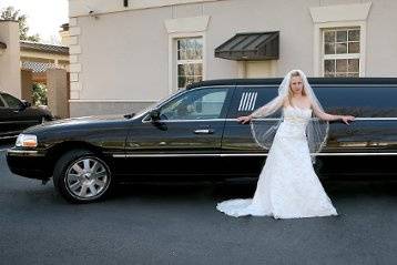 Bride with Traditional Black Lincoln Stretch Limousine