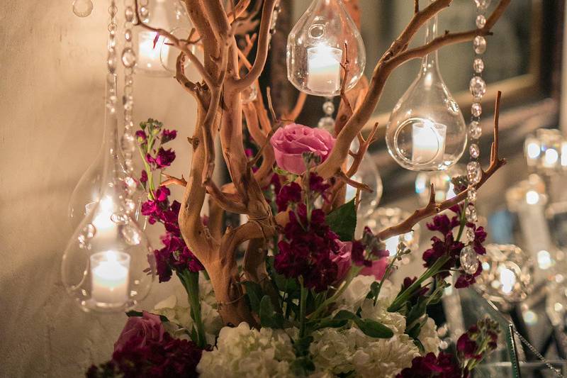 Candle with floral decorations