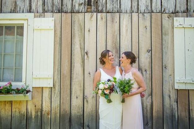 Two women holding bouquets