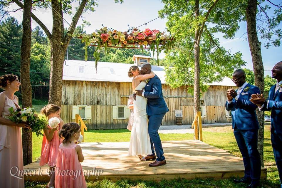 Newly wed couple share their first kiss