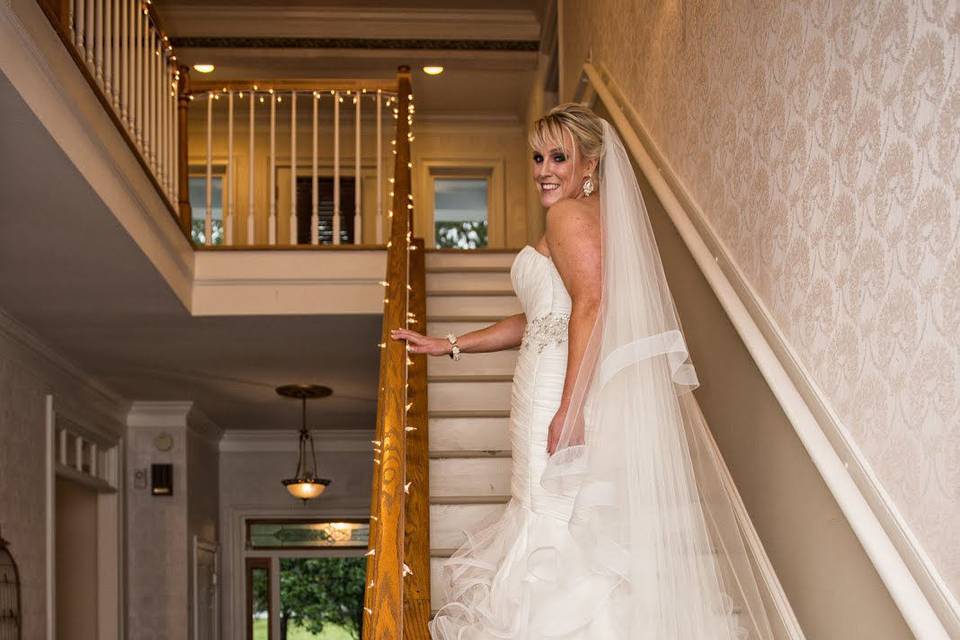 Bride walking up the stairs
