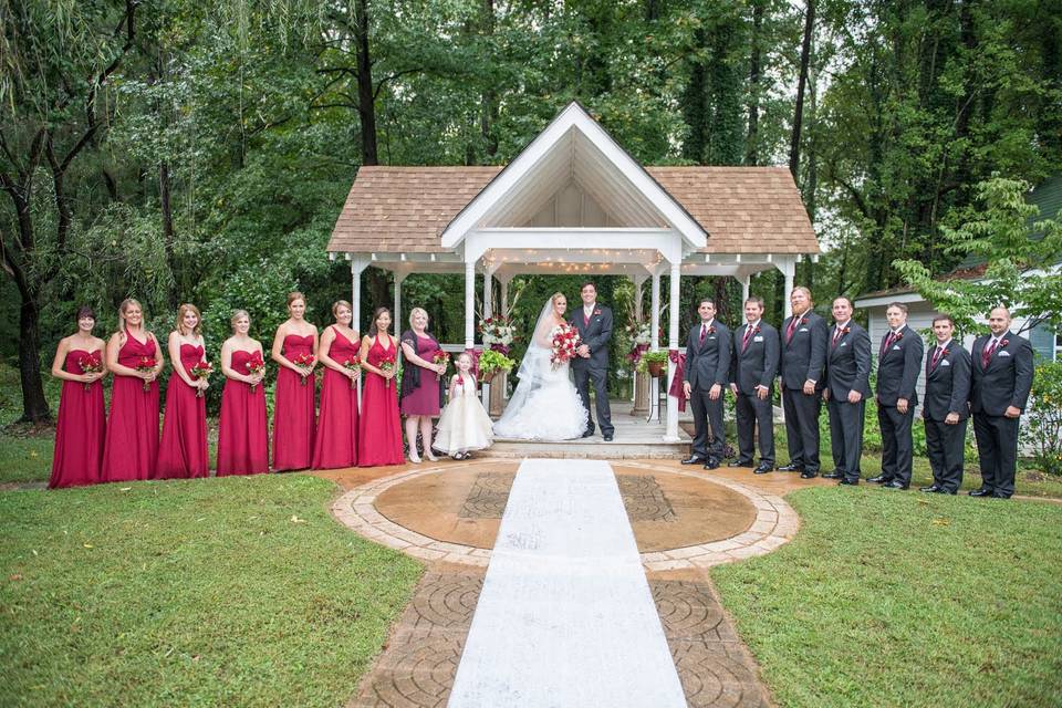 Wedding party in front of the gazebo