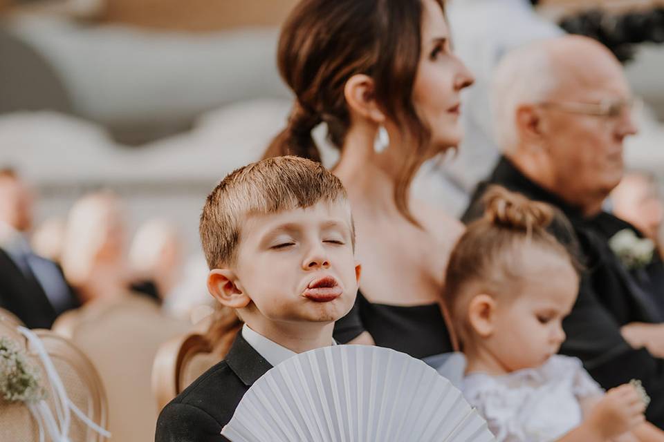 Little kid at ceremony