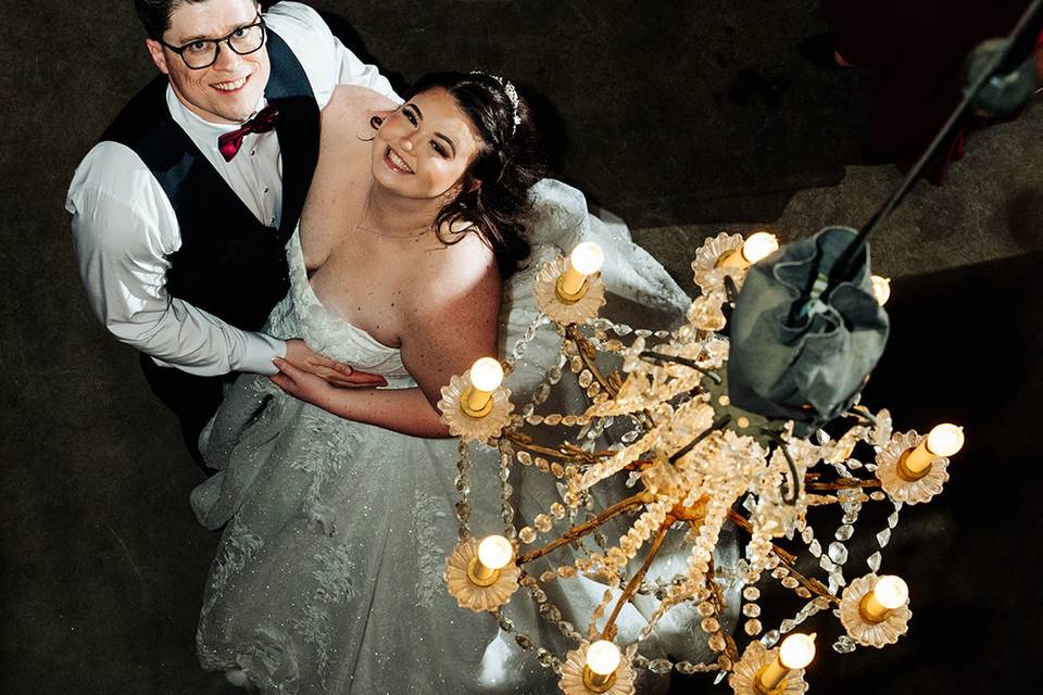 Couple under Chandelier