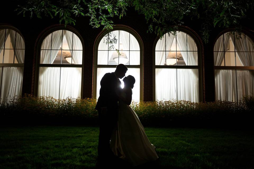 Bride and groom in silhouette