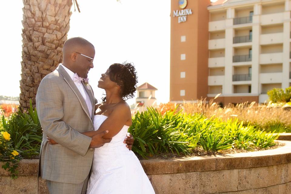 The exterior of the marina inn is a perfect site for evening photos of the bride and groom.