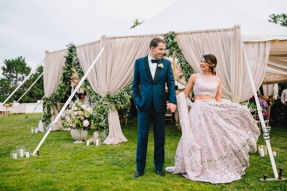 Bride & Groom in front of tent