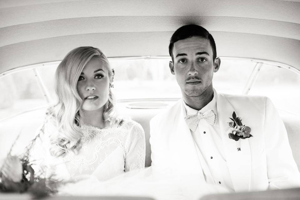 Newlyweds in their car