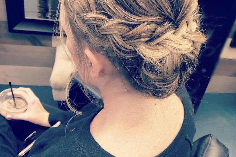Low updo with accent braid