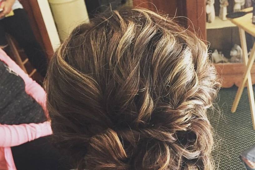 Tousled and textured side updo
