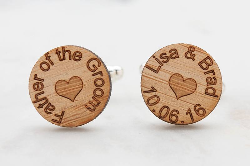 Father of the Groom cufflinks, laser engraved with wedding names of bride and groom with wedding date.  A tiny heart adds an extra touch of love.  Hand crafted from eco-friendly bamboo.  Available in silver, gold and antique bronze bullet-style cufflink backs.