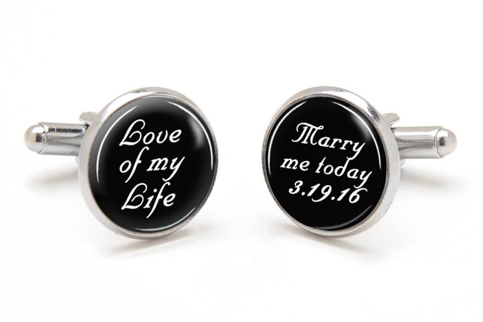 Groom Cufflinks printed with the sentimental message, Love of my Life, Marry me today, with wedding date.  Laser printed on a black background with white font, preserved under a clear glass dome.  Available in silver, gold and antique bronze bullet-style cufflink backs.